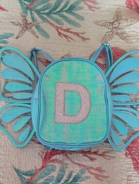 justice girls mini butterfly wing backpack Holographic Wings Unicorn BUTTERFLY KINGDOM and printed details Coordinating interior lining Dimensions Justice | Accessories | Nwt